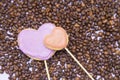 Coffee with sweets on light purple background Royalty Free Stock Photo