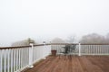 Coffee Table on the old deck in a foggy morning