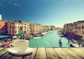 Coffee on table and Venice in sunset time Royalty Free Stock Photo