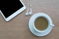 Coffee with tablet and headphones