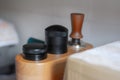 Coffee Tamping and Distribution Tools on Wooden Base Royalty Free Stock Photo