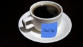 Coffee with text message - Think Big. With message sticked to a cup of black coffee on the table. Royalty Free Stock Photo