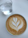 Coffee time, cup of coffee with a glass of water in a cafÃ© in Varna (Bulgaria, EU)