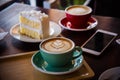 Coffee time in the wood table cafe , drink coffee and tasty cake Royalty Free Stock Photo