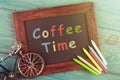 coffee time written in on black chalkboard Royalty Free Stock Photo