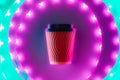 Coffee to go craft cup circling in led neon light.