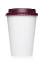 Coffee to go in a disposable cup with red plastic lid on a white background Royalty Free Stock Photo