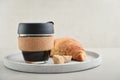 Coffee to-go in reusable travel mug