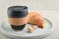 Coffee to-go in reusable travel mug