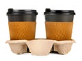 coffee to go. Several paper coffee cups on a stand on a white isolated background.