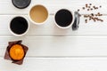Coffee to go on white wooden background top view mockup Royalty Free Stock Photo