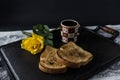 Coffee, toast and roses, romantic breakfast on Valentine's Day. Served on an iron tray with copy space Royalty Free Stock Photo