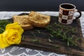 Coffee, toast and roses, romantic breakfast on Valentine's Day. Served on an wooden board with copy space Royalty Free Stock Photo