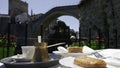 Coffee and Turkish sweets on the table with the view of Old bridge - Mostar, Bosnia and Herzegovina Royalty Free Stock Photo