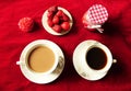 Coffee for two in the white cups on the red background. Royalty Free Stock Photo