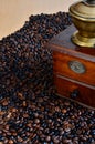 Coffee and vintage coffee grinder Royalty Free Stock Photo