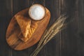Coffee white cup and croissant for breakfast on wooden background on the table. Perfect breacfast in the morning Royalty Free Stock Photo