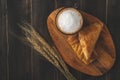 Coffee white cup and croissant for breakfast on wooden background on the table. Perfect breacfast in the morning Royalty Free Stock Photo