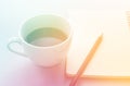 Coffee in white cup with Journal book and pencil Royalty Free Stock Photo