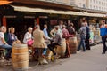 Coffee and wine break at popular outdoor cafe with drinking people in Vienna