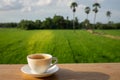 Coffee on wood with nature background