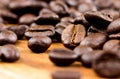 Coffee on wooden background Fresh coffee beans on wood