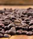 Coffee on wooden background Fresh coffee beans on wood