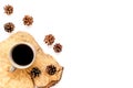 Coffee on wooden sawcut and pine cone pattern for blog on white background top view mock up Royalty Free Stock Photo