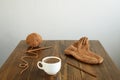 Coffee, woolen sock and knitting on a table Royalty Free Stock Photo