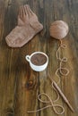 Coffee, woolen sock and knitting on a table Royalty Free Stock Photo