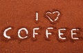Coffee word written on ground coffee Royalty Free Stock Photo