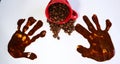 Coffeebeans and a red espresso cup on a table