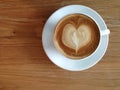 Coffeecup of with heart shape art on foam Royalty Free Stock Photo