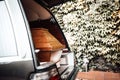 coffin in the back of a car at a funeral Royalty Free Stock Photo