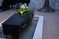 Coffin with funeral flowers Royalty Free Stock Photo