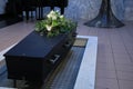 Coffin with funeral flowers