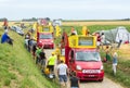 Cofidis Caravan on a Cobblestone Road- Tour de France 2015