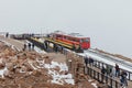 Cog railroad waiting for tourists surprised by a snow storm Royalty Free Stock Photo