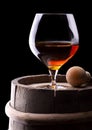 Cognac or brandy on a black Royalty Free Stock Photo