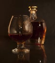 Cognac. Brandy Glass and bottle Royalty Free Stock Photo