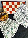 Cognac money and chess board