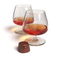 Cognac glasses and chocolate candy Royalty Free Stock Photo