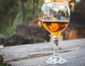 Cognac in glasses on rustic backgrpund