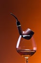 Cognac and pipe Royalty Free Stock Photo