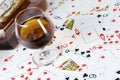 Cognac and playing card Royalty Free Stock Photo