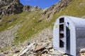 COGNE, ITALY - AUGUST 22, 2014: Alpine bivouac Franco Nebbia situated in the tall Arpisson walloon.