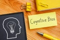 Cognitive Bias is shown on the photo using the text