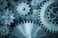 Cogs and gears blue metal background