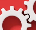 Cog teeth close up of two white connecting gear cogs isolated on red background, 3d illustration