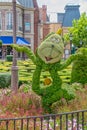 Cogsworth character topairy displayed at Epcot Royalty Free Stock Photo